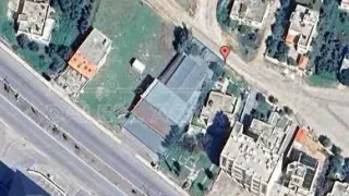 أرض في اربد-شارع البترا - 550,000 دأ - صورة 1