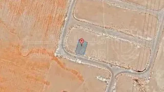 أرض في قرية الصلاحية - امتداد طريق المطار - 25,000 دأ - صورة 1