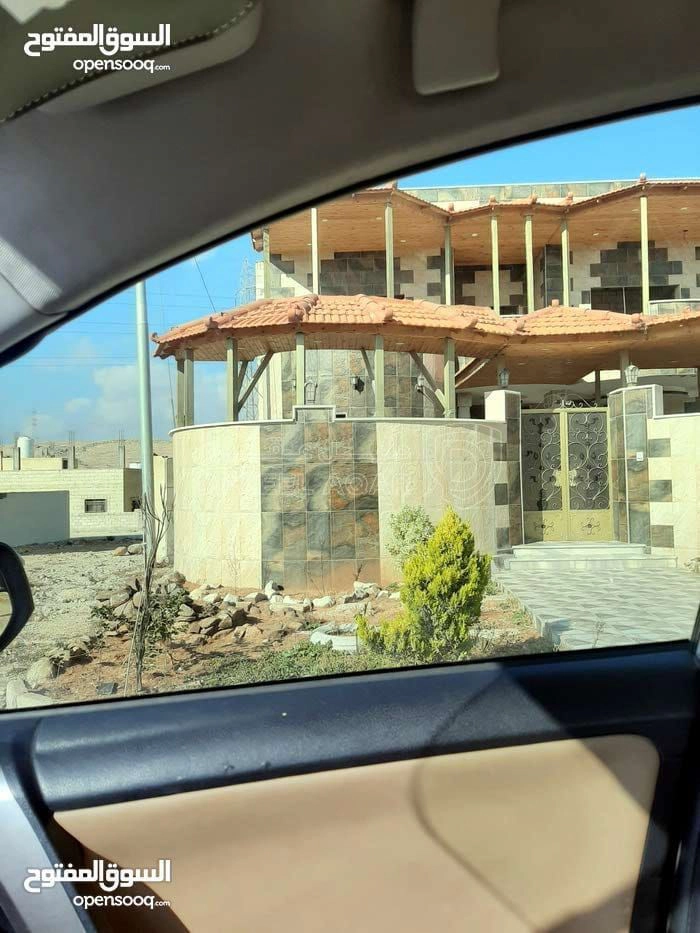 أرض في الهاشمية الزرقاء الاسكان حارة. العوايد - 18,000 دأ - صورة 1