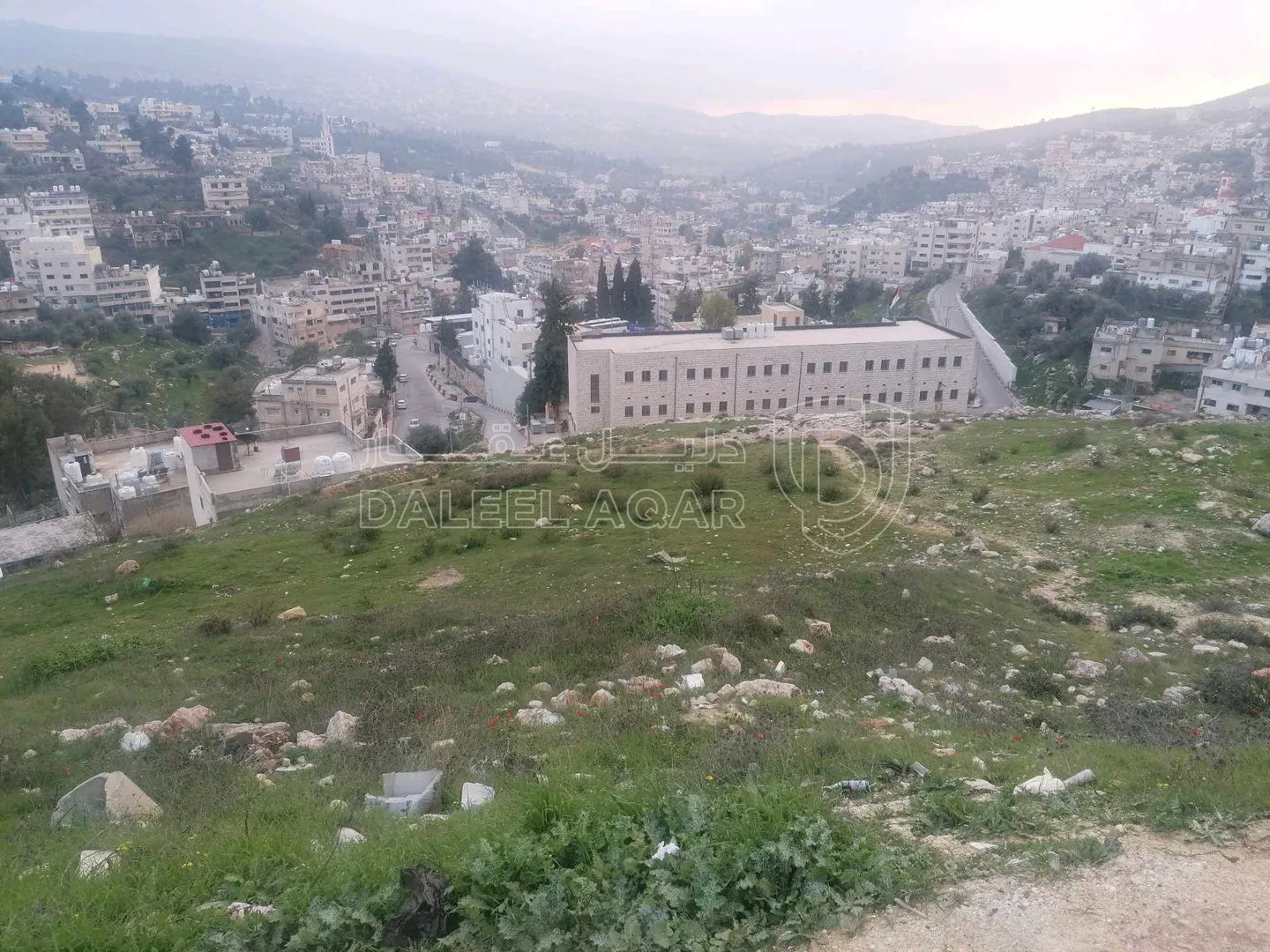 أرض في عجلون / البلد / قرب مدرسه عجلون الثانويه للبنين - 55,000 دأ - صورة 1