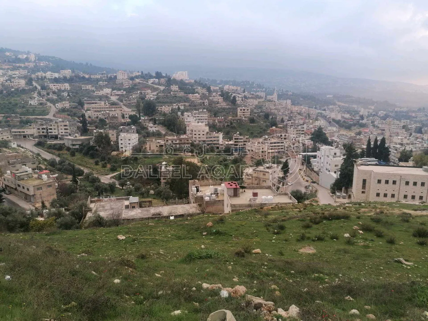 أرض في عجلون / البلد / قرب مدرسه عجلون الثانويه للبنين - 55,000 دأ - صورة 1