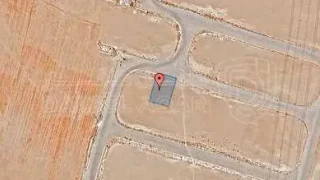 أرض في قرية الصلاحية - امتداد طريق المطار - 25,000 دأ - صورة 1
