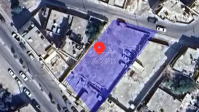 أرض في إربد شارع فلسطين و شارع عبد الرحمن ارشيدات  - 250,000 دأ - صورة 1