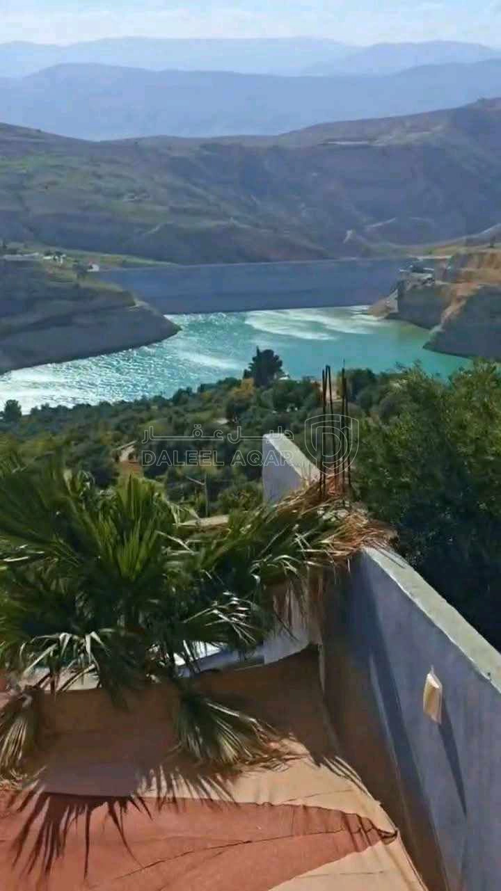 مزرعة/شاليه في عجلون كفرنجه مقابل سد كفرنجه قرب راجب - 300,000 دأ - صورة 1