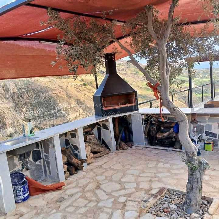 مزرعة/شاليه في عجلون كفرنجه مقابل سد كفرنجه قرب راجب - 300,000 دأ - صورة 1