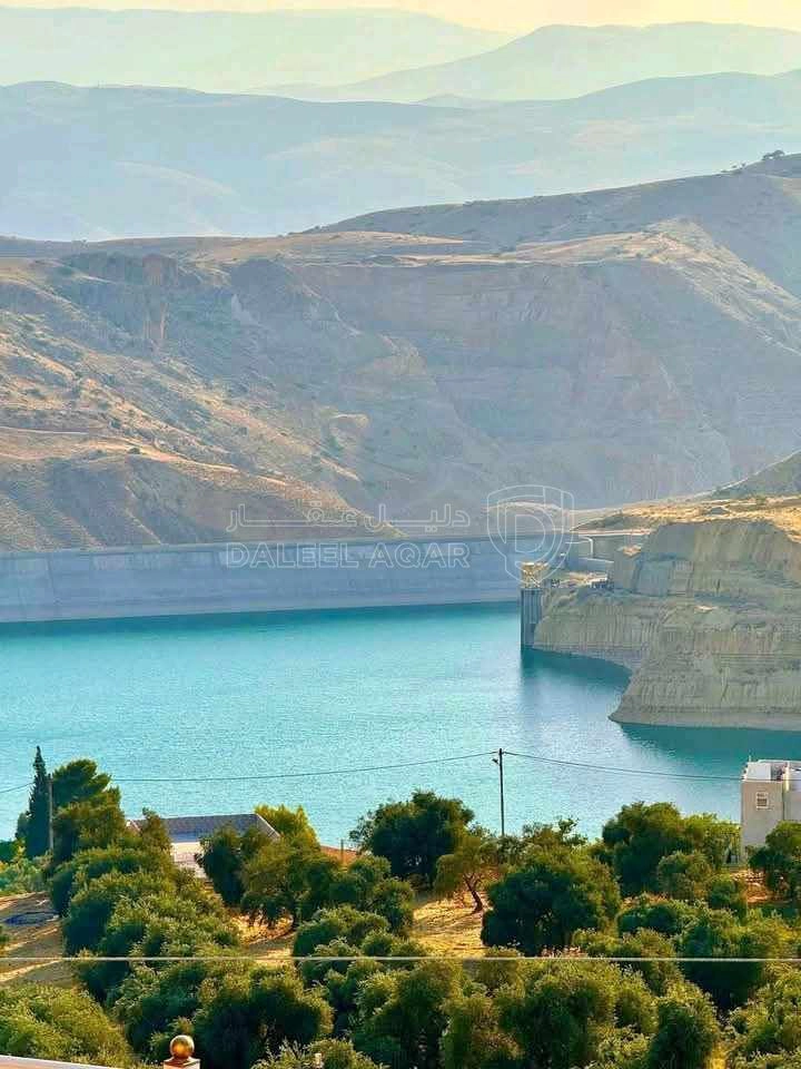 مزرعة/شاليه في عجلون كفرنجه مقابل سد كفرنجه قرب راجب - 300,000 دأ - صورة 1