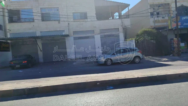 مبنى - اربد،حي الإيمان،شارع الشهداء،( شارع الجملة)  - 300000 دأ