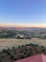 مزرعة/شاليه في الجبل الغربي المقابل لمطعم السمك - 290,000 دأ - صورة NaN