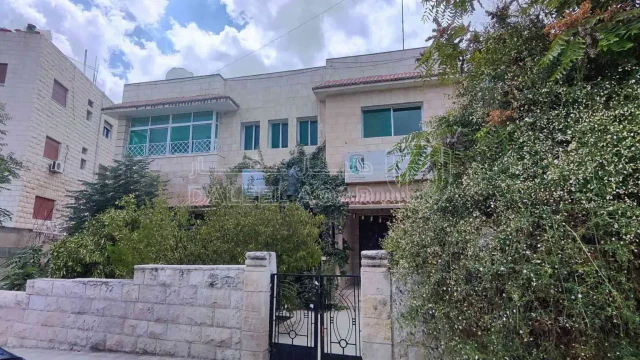 مبنى  - 390000 دأ