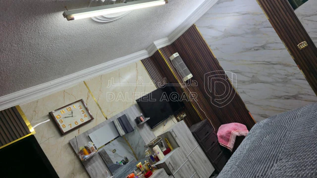 شقة في قرب مستشفى الامير حمزه نزول بعد صيدليه الفارمسي  - 28,000 دأ - صورة NaN