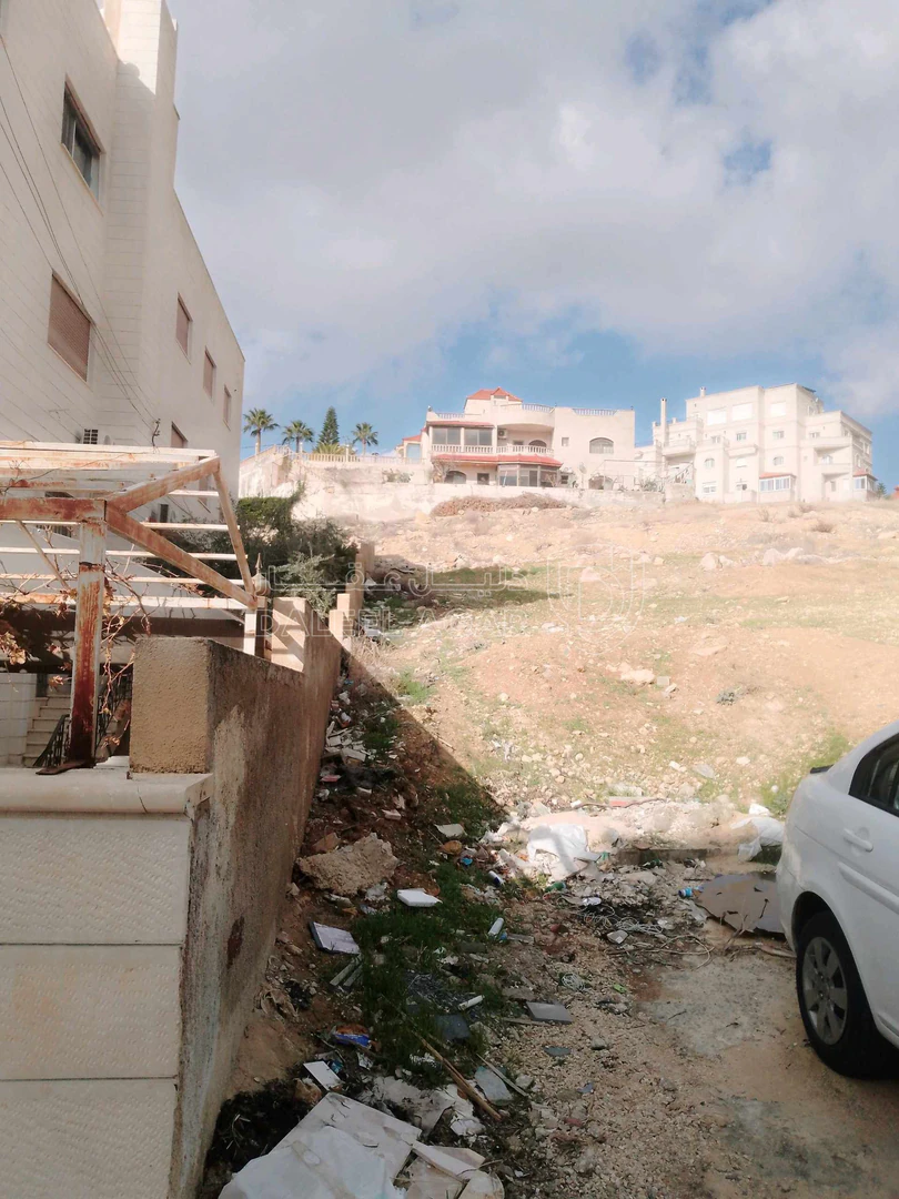 أرض في عمان شفى بدران مقابل سكانات ريان - 210,000 دأ - صورة 1