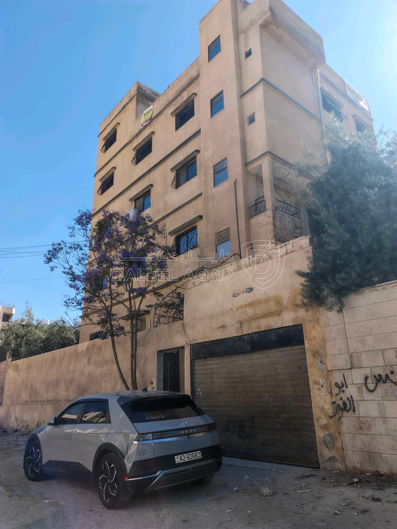 مبنى في عمارة سكنية القويسمة مقابل الستاد - 120,000 دأ - صورة 1