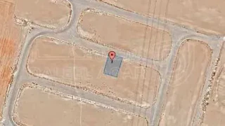 أرض في قرية الصلاحية - امتداد طريق المطار - 25,000 دأ - صورة 1