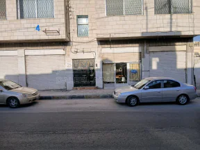 مبنى في عمارة للبيع سكنيه برصيفه مع مخازن  - 200,000 دأ - صورة NaN