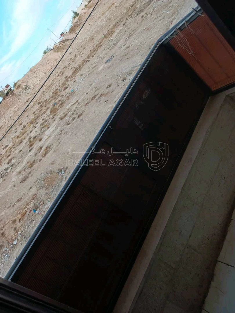 شقة في شقة في اسكان الفردوس بمساحة 100 متر - 22,000 دأ - صورة 1