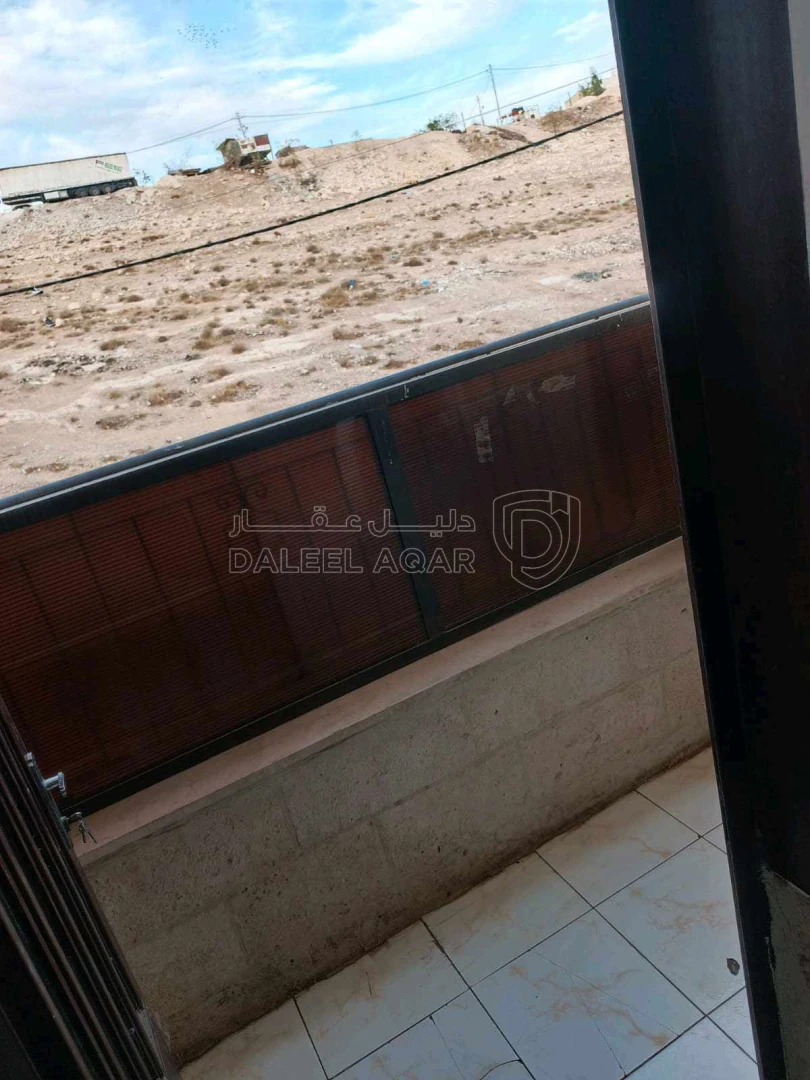 شقة في شقة في اسكان الفردوس بمساحة 100 متر - 22,000 دأ - صورة 1