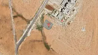 أرض في الماضونة - امام الجمرك الجديد مباشرة  - 37,000 دأ - صورة 1