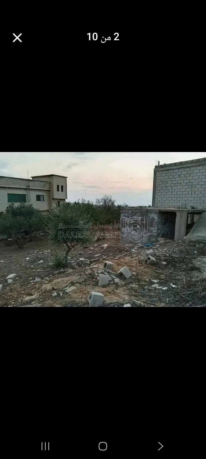 أرض في ارض دونم و15متر  عليها بيت عظم 220 متراربد كفريوبا - 65,000 دأ - صورة 1