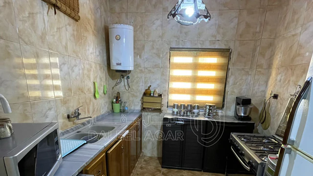 شقة في الزرقاء - حي معصوم  - 16,500 دأ - صورة NaN