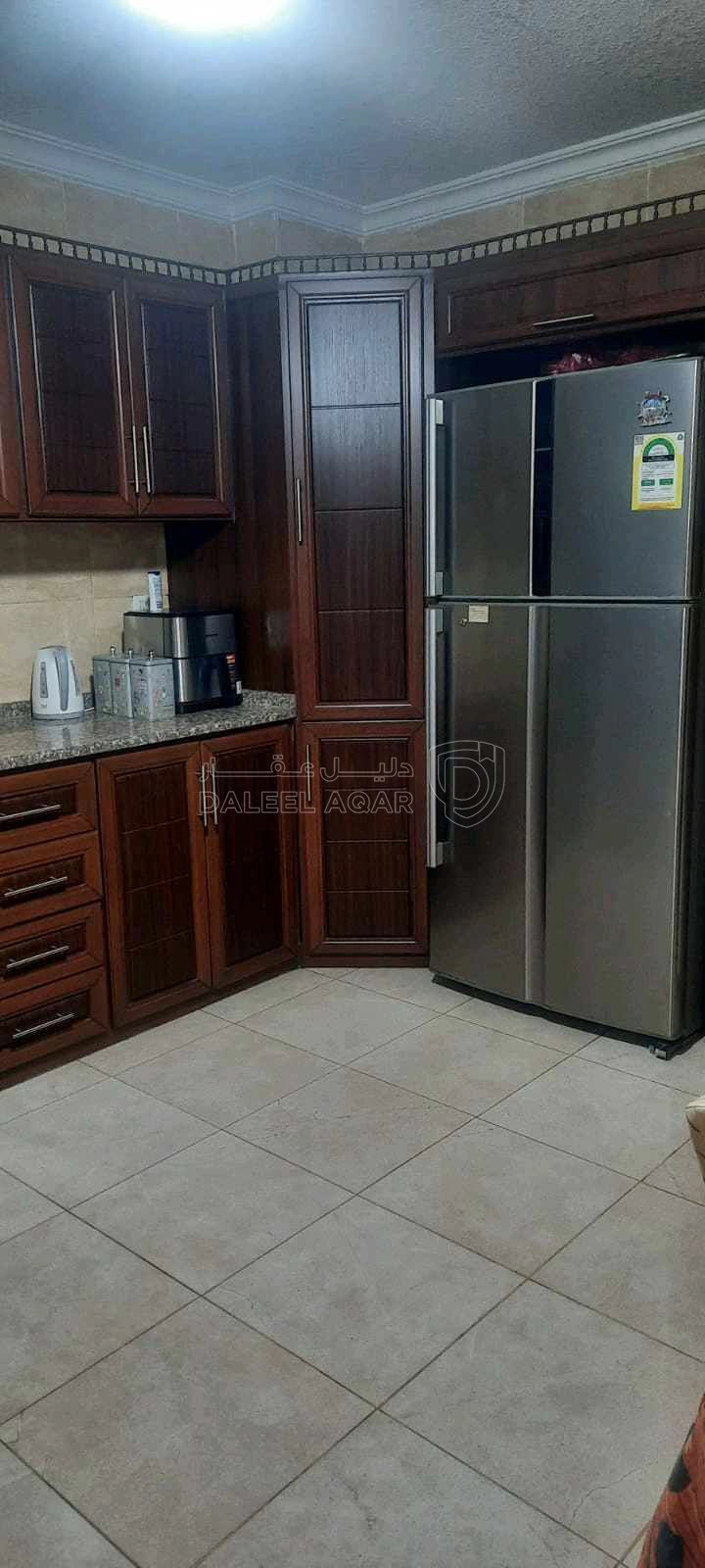 شقة في شقة طابق ارضي للبيع في الهاشمي الشمالي - 68,000 دأ - صورة 1