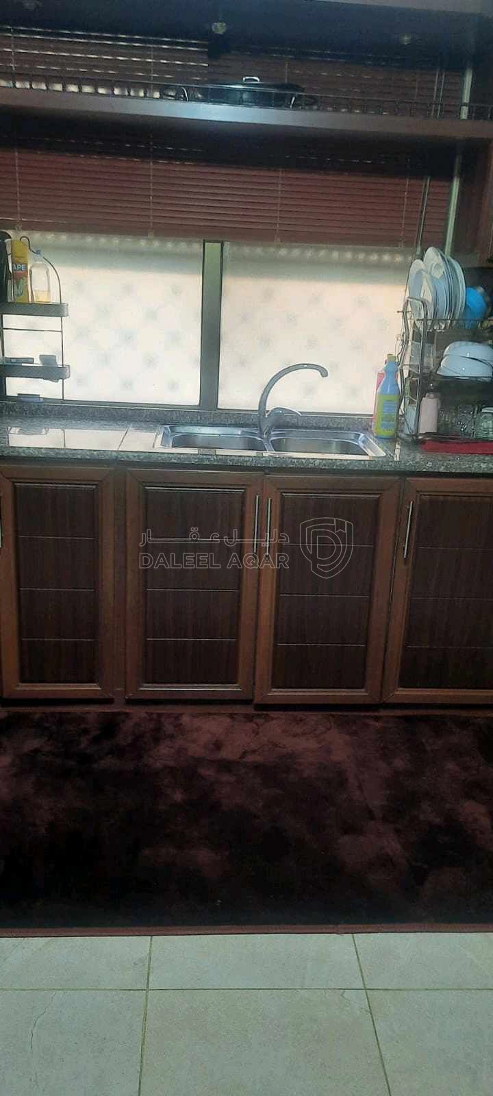 شقة في شقة طابق ارضي للبيع في الهاشمي الشمالي - 68,000 دأ - صورة 1