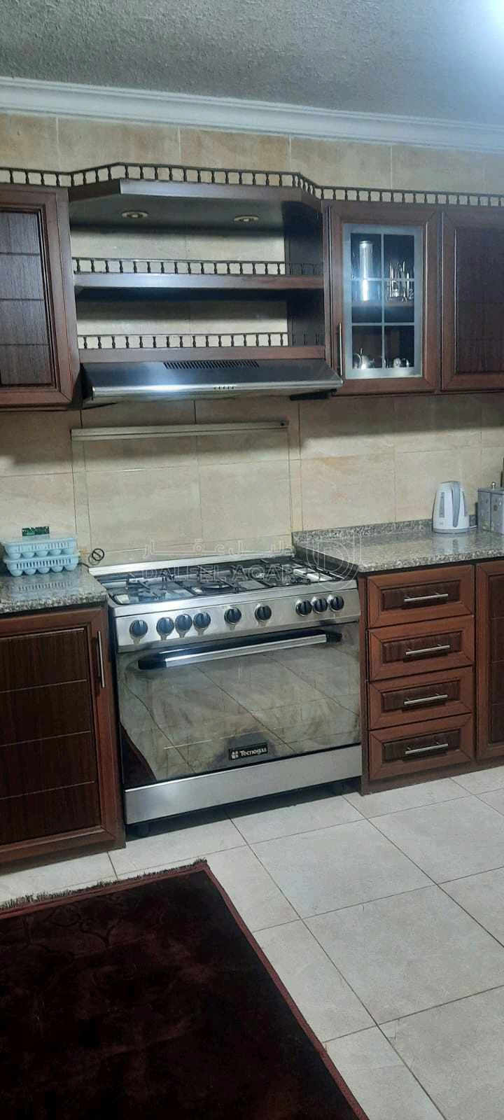 شقة في شقة طابق ارضي للبيع في الهاشمي الشمالي - 68,000 دأ - صورة 1