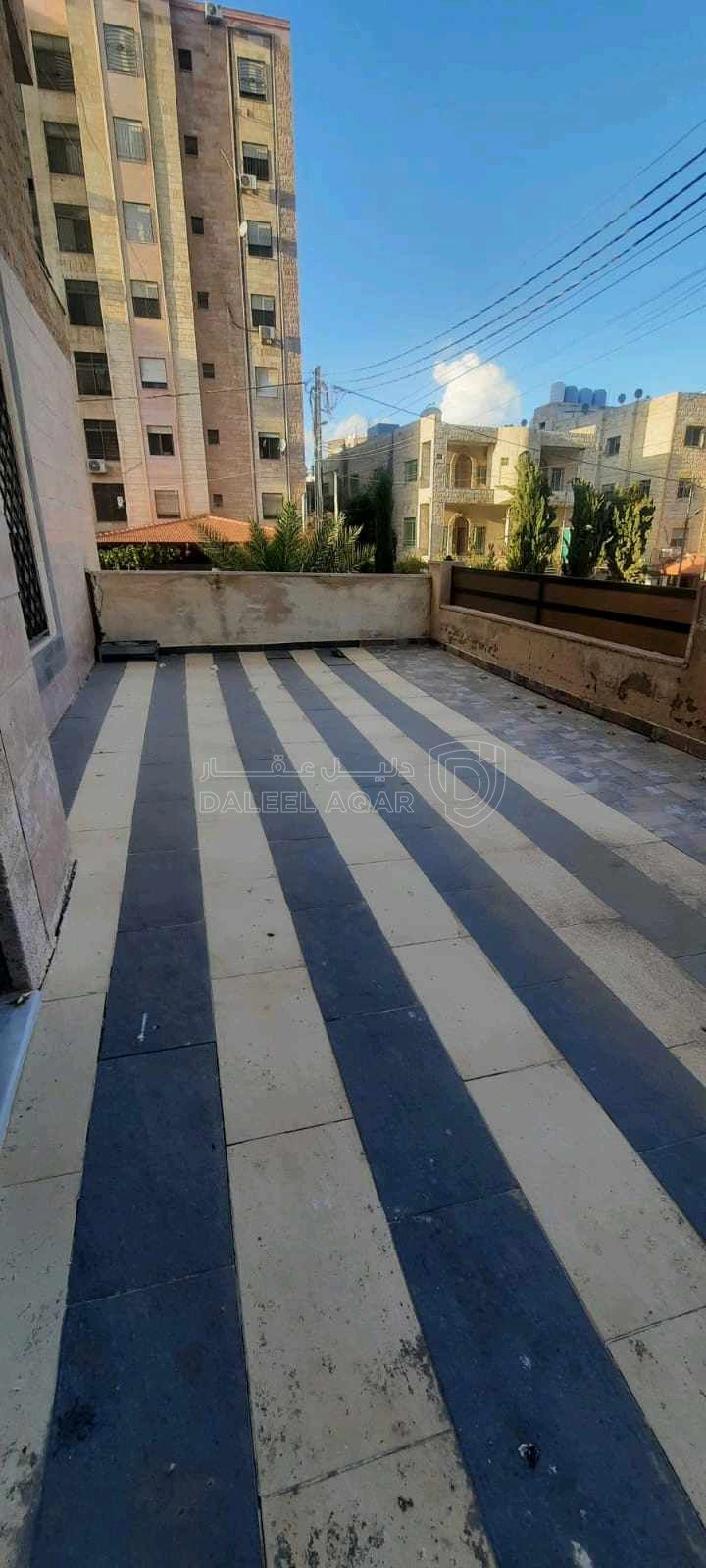 شقة في شقة طابق ارضي للبيع في الهاشمي الشمالي - 68,000 دأ - صورة 1