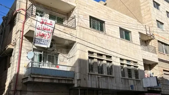 مبنى - الزرقاء وسط البلد شارع الامير نايف مقابل مدرسة الم - 120000 دأ