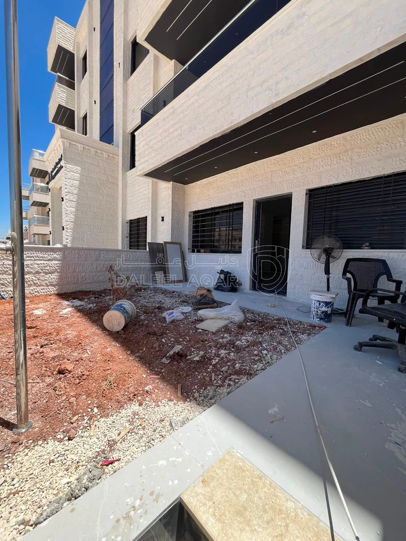 شقة في شقة طابق ارضي مع ترس في اجمل مناطق البنيات - 93,000 دأ - صورة 1