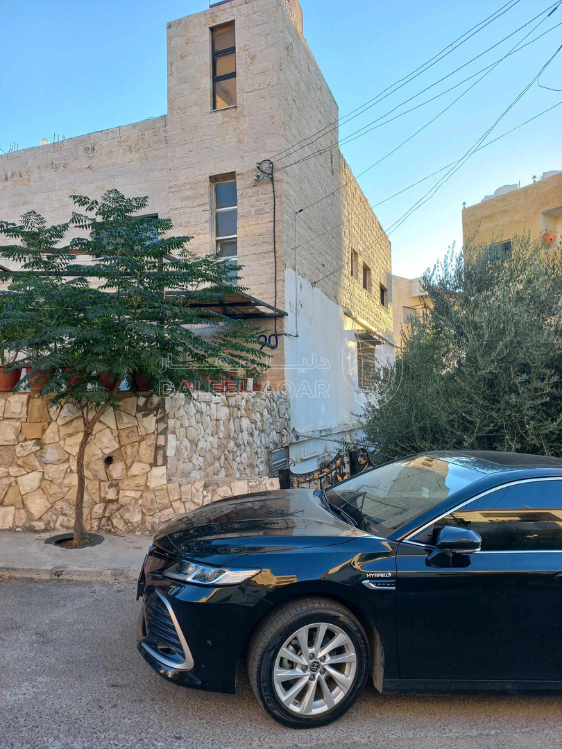 مبنى في السلط البقيع بعد مركز الصحي البقيع الشامل ب ٥٠م - 180,000 دأ - صورة 1