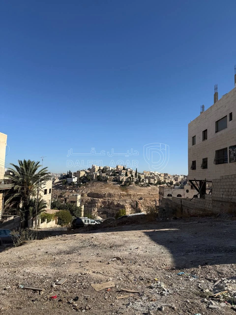 أرض في ارض للبيع في جبل الزهور على شارعين بسعر مغري  - 69,000 دأ - صورة 3