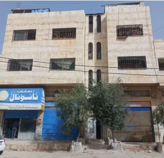 مبنى في السخنه الحى التجارية ،بجانب صيدلية نايف  - 100,000 دأ - صورة 1