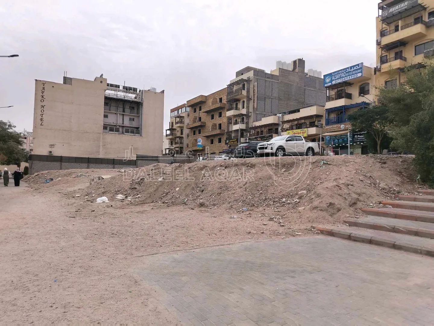 أرض في شارع الملك حسين مقابل القلعة والبحر - 1,500,000 دأ - صورة 1