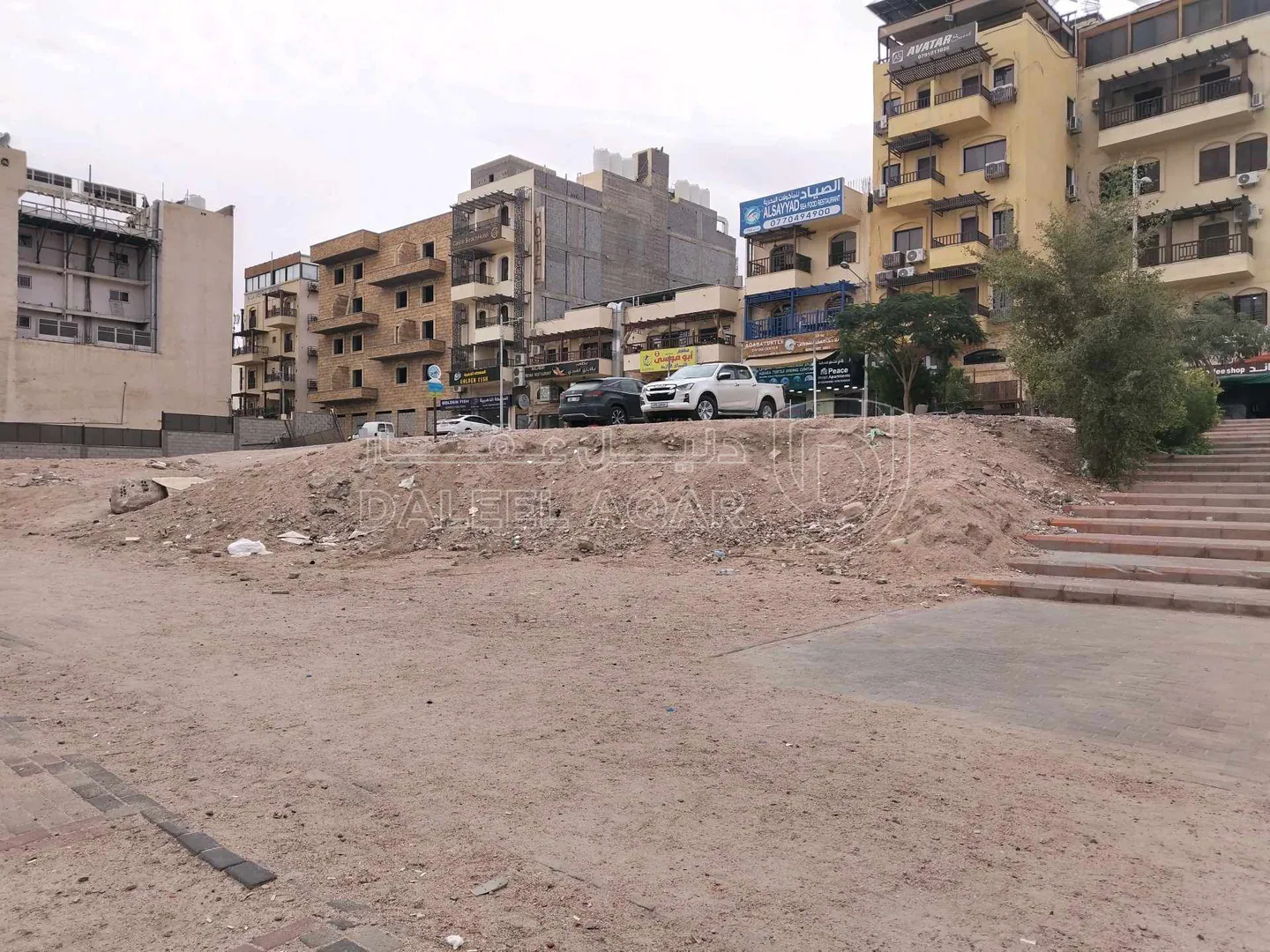 أرض في شارع الملك حسين مقابل القلعة والبحر - 1,500,000 دأ - صورة 1