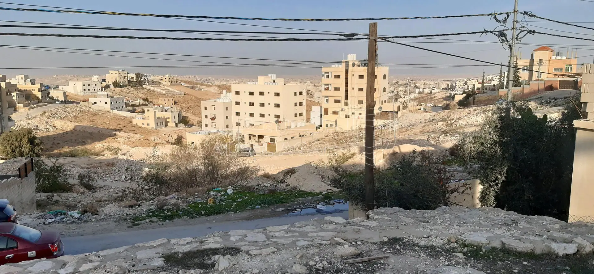 أرض في حي القادسية بقرب حاووز الماء  - 36,000 دأ - صورة 1