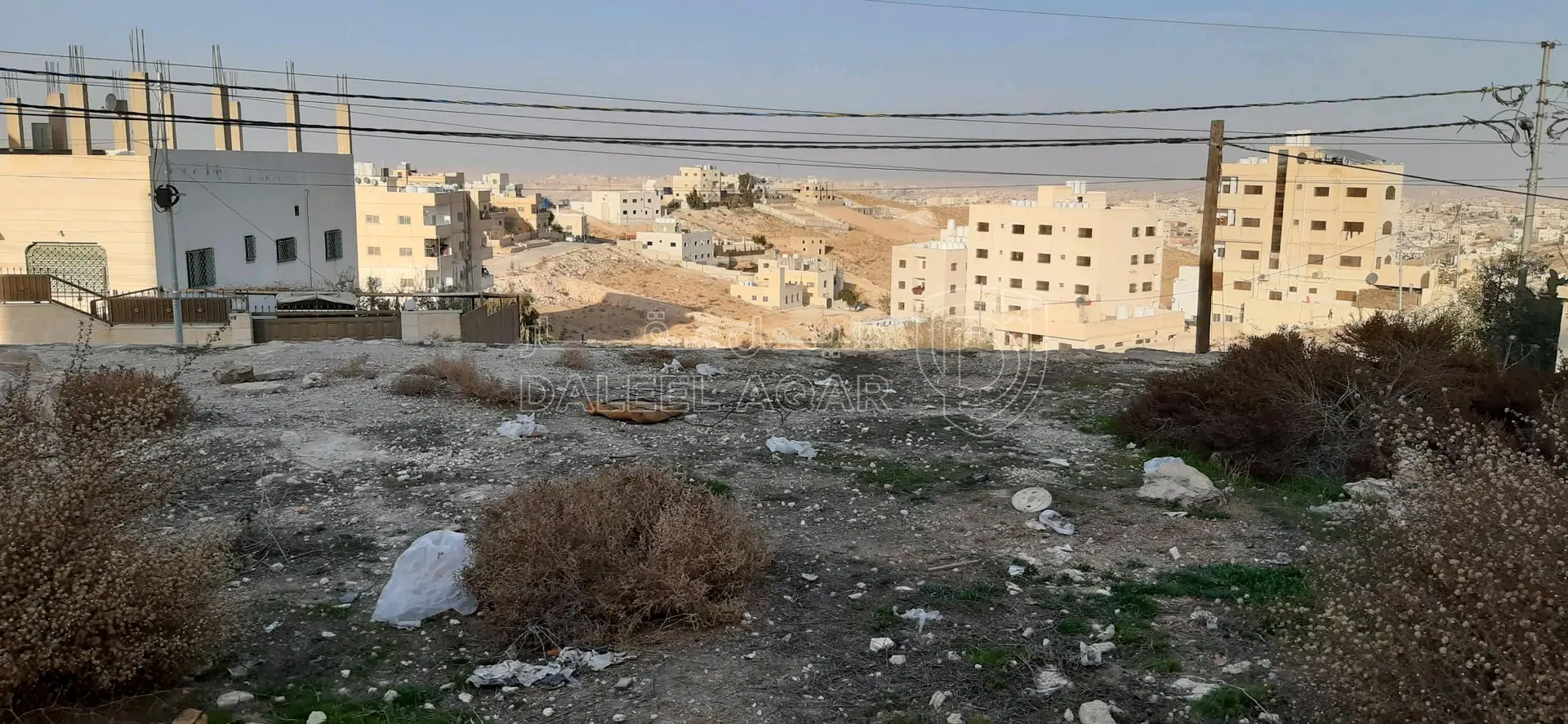 أرض في حي القادسية بقرب حاووز الماء  - 36,000 دأ - صورة 1