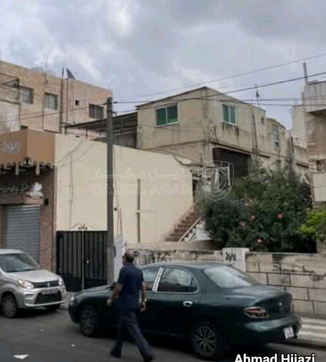 مبنى في عمان طبربور مقابل مطعم الدار دارك - 950,000 دأ - صورة 1