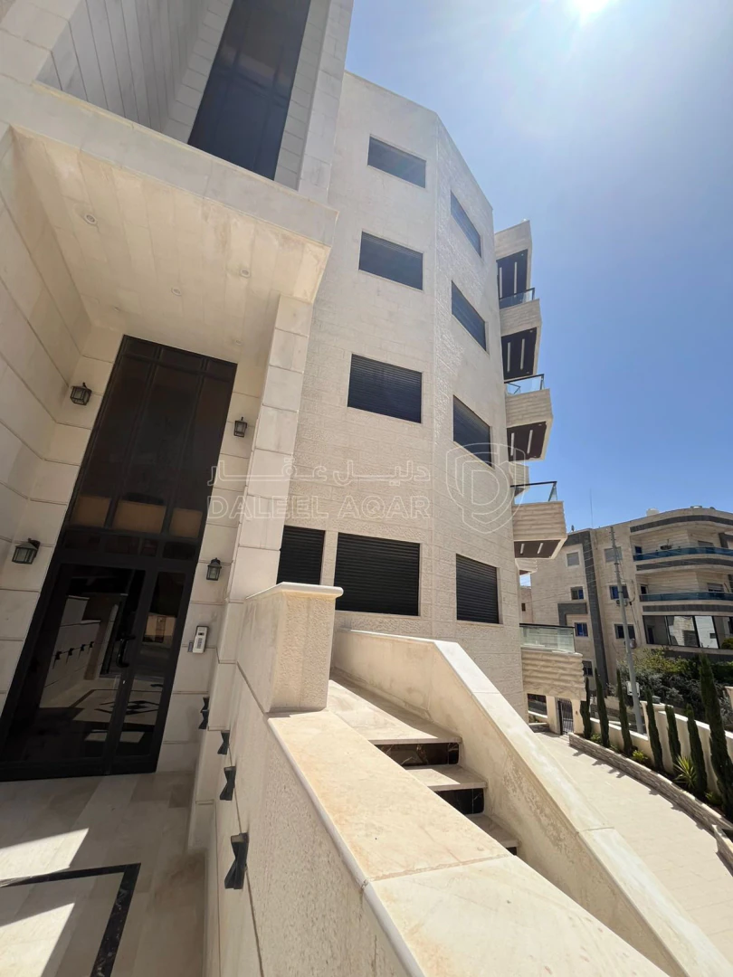 شقة في شبه ارضي لقطة قرب دوار الاتصالات مرج الحمام  - 100,000 دأ - صورة 1