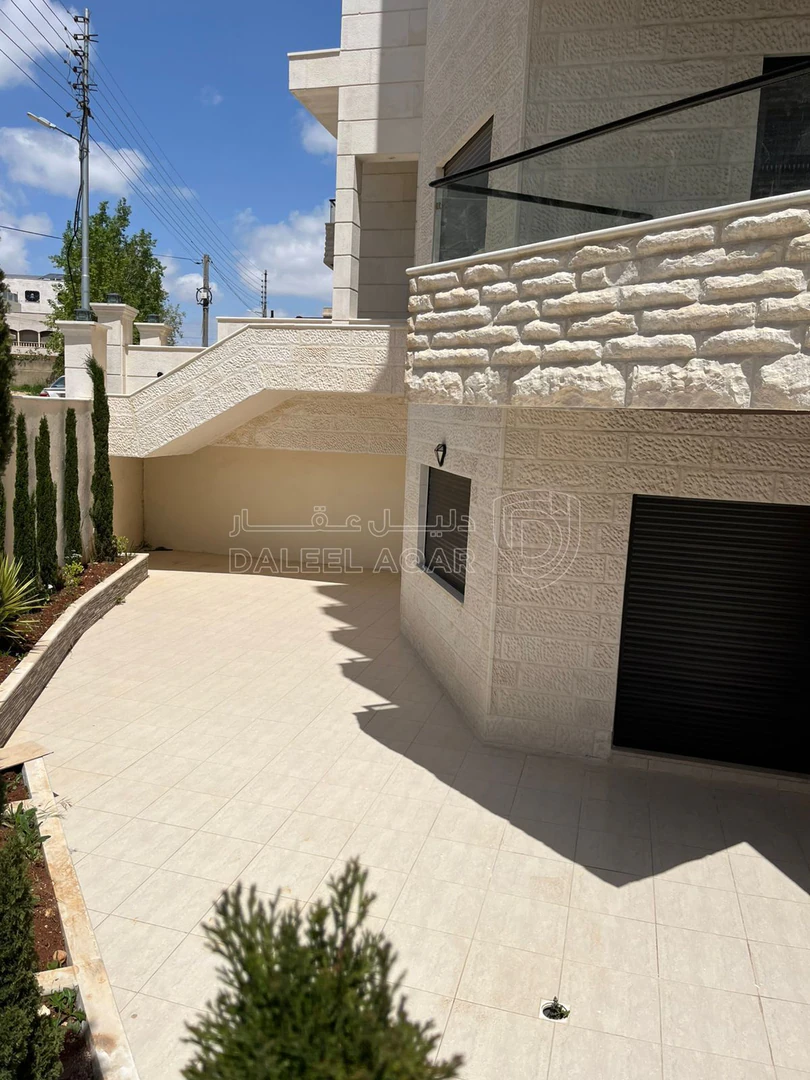 شقة في شبه ارضي لقطة قرب دوار الاتصالات مرج الحمام  - 100,000 دأ - صورة 1