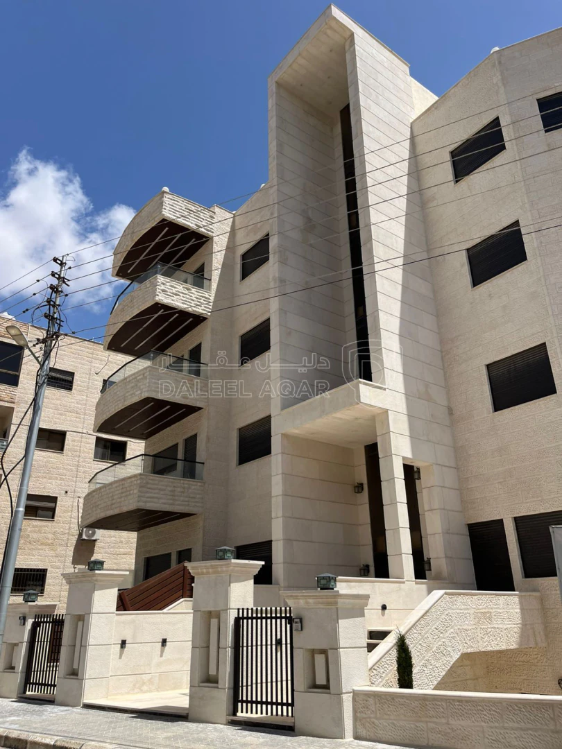 شقة في شبه ارضي لقطة قرب دوار الاتصالات مرج الحمام  - 100,000 دأ - صورة 1