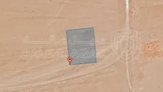أرض في خلف مطار الشحن قرب إسكان زوانه - 35,000 دأ - صورة 1