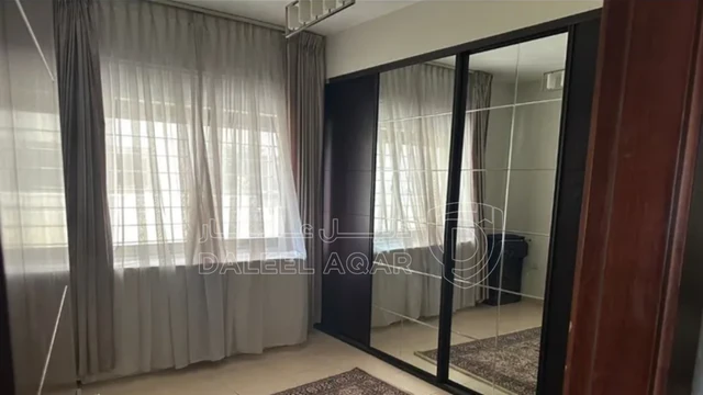 شقة في دوبلكس أرضي فاخر للبيع شبه ڤيلا بحديقة خاصة وكراج  - 300,000 دأ - صورة NaN