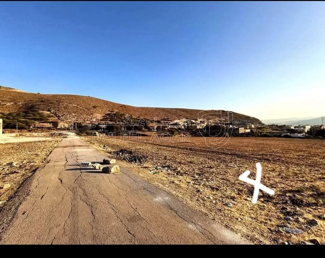 أرض في ذراع الخان الشمالي قرة معاذ - 18,000 دأ - صورة 1