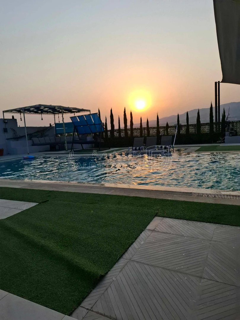 مزرعة/شاليه في طريق عمان حرش المصطبة خلف عسل الطيبات والبان فادي - 170,000 دأ - صورة 1