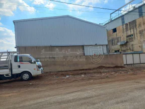 مبنى في الرجيب - بجوار مصنع ألبان حارتنا - 310,000 دأ - صورة NaN