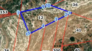 أرض في شرق كفرعوان منطقة وعيره - 100,000 دأ - صورة 1