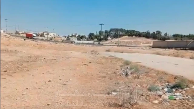 أرض في الزرقاء الضليل قرب بلدية الضليل شارع الثلاثين  - 20,000 دأ - صورة NaN