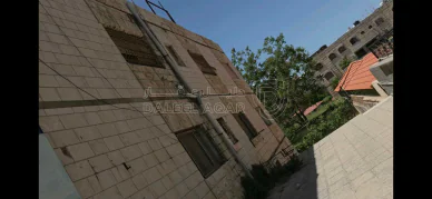 مبنى في ام اذينه الشمالي بجانب الاردنية للطيران - 650,000 دأ - صورة NaN