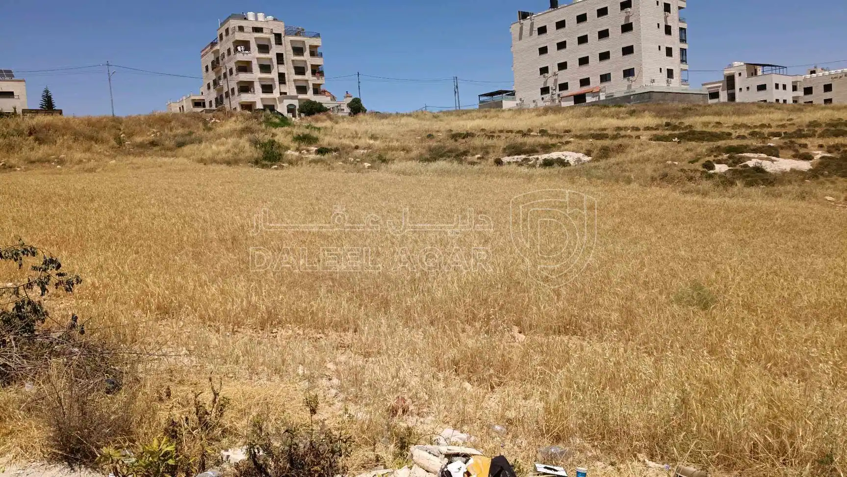 أرض في الحي المفابل لكازية السلام - 225,000 دأ - صورة 1