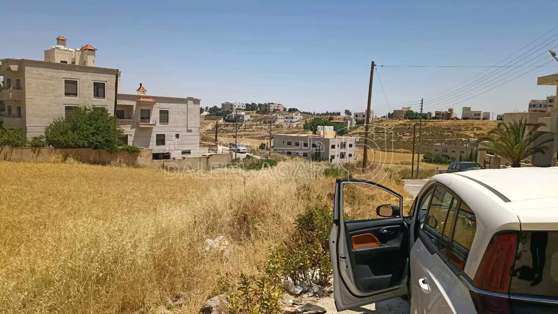 أرض في الحي المفابل لكازية السلام - 225,000 دأ - صورة 1